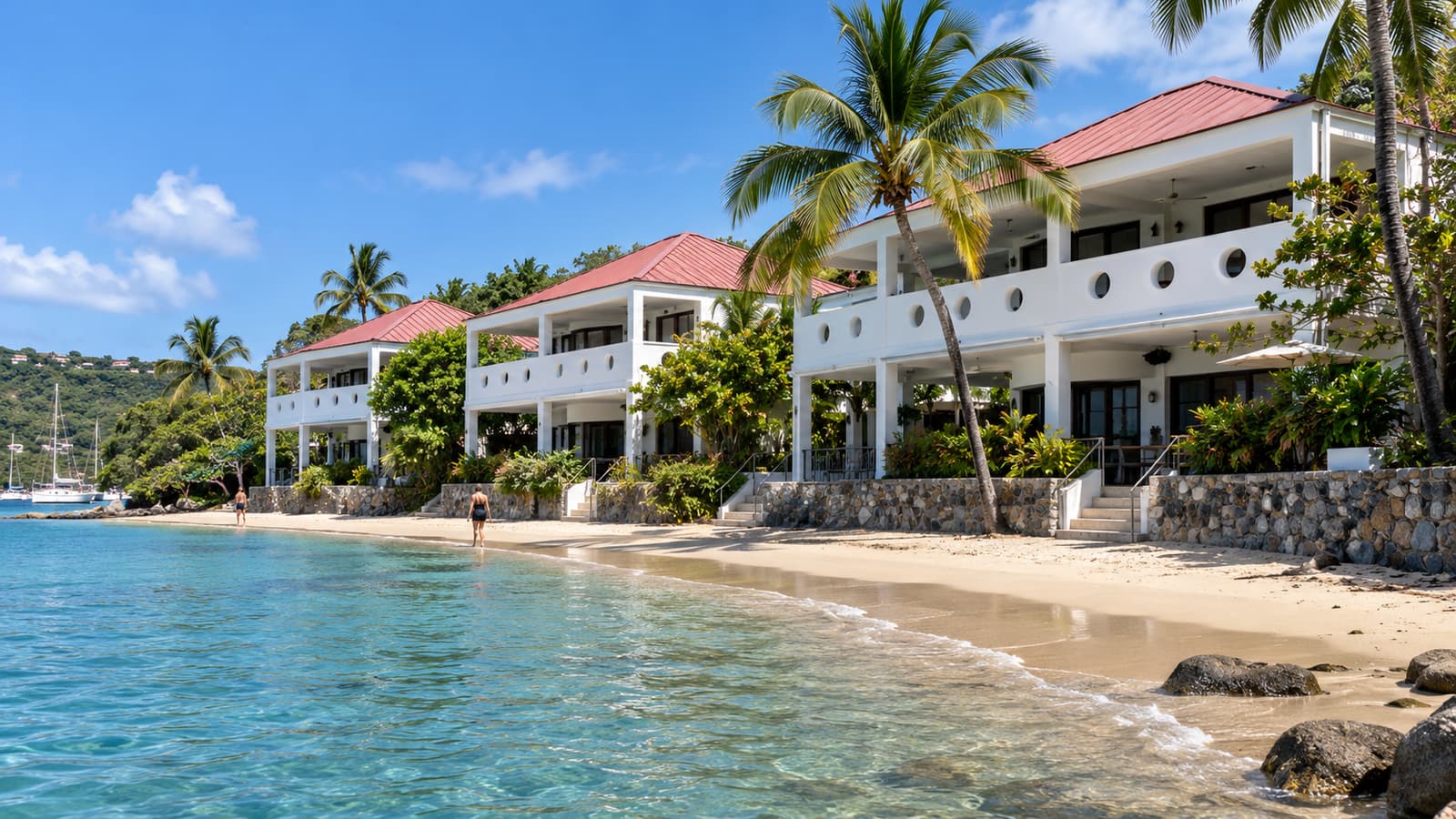 Illustration of white waterfront buildings with circular balcony openings beside a sandy beach.
